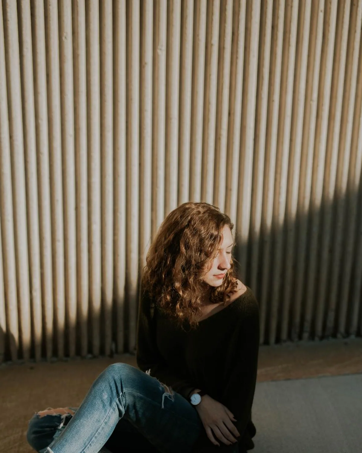 Petite woman wearing wide-leg jeans